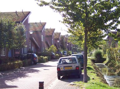 5 archetype landschapsarchitectuur tuinontwerp nijmegen straatje met grasdak woningen