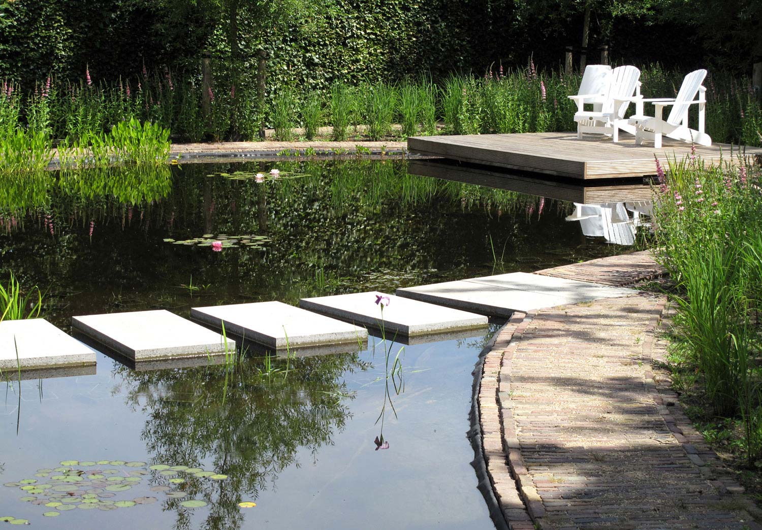 deze foto met panta rei landschapstuinontwerp in nijmegen van het buitenland linkt door naar de pagina landschapstuin panta rei